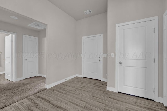 9110 Lexford Dr, Amarillo, TX 79119 - unfurnished bedroom featuring light wood-style flooring and baseboards