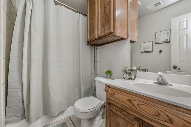 2002 SW 61st Ave, Amarillo, TX 79118 - full bathroom with vanity, toilet, a shower with curtain, and tile patterned flooring