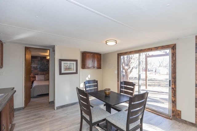 dining area featuring light hardwood / wood-style floors