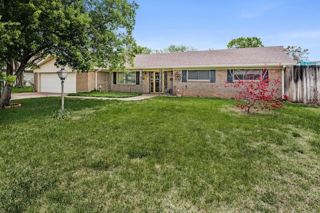 613 Bennett Dr, Dumas, TX 79029 - single story home featuring brick siding, an attached garage, and concrete driveway