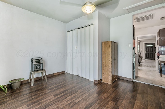 126 S Nelson St, Pampa, TX 79065 - bedroom with wood finished floors, baseboards, a closet, and a ceiling fan