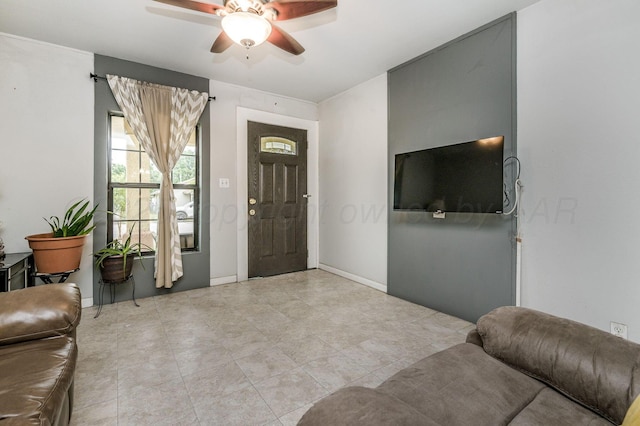 126 S Nelson St, Pampa, TX 79065 - foyer entrance featuring ceiling fan and light tile patterned floors