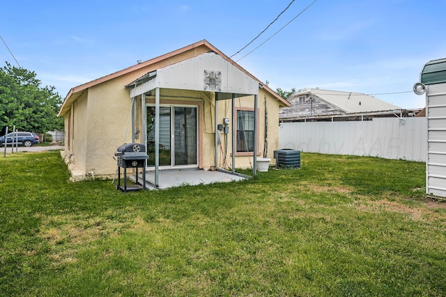 126 S Nelson St, Pampa, TX 79065 - back of house featuring a patio, central AC unit, and stucco siding