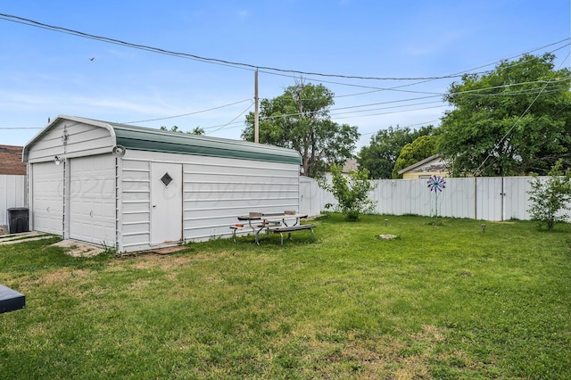126 S Nelson St, Pampa, TX 79065 - view of yard with an outbuilding and a garage