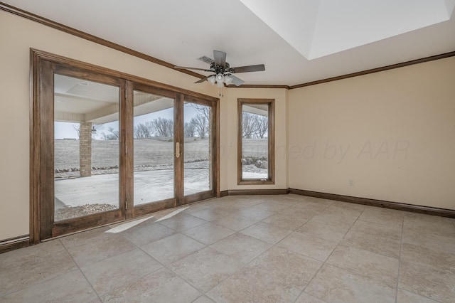 unfurnished room featuring ornamental molding, a ceiling fan, visible vents, and baseboards