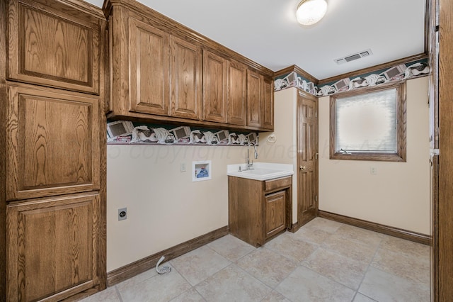 laundry room featuring washer hookup, visible vents, cabinet space, hookup for an electric dryer, and a sink