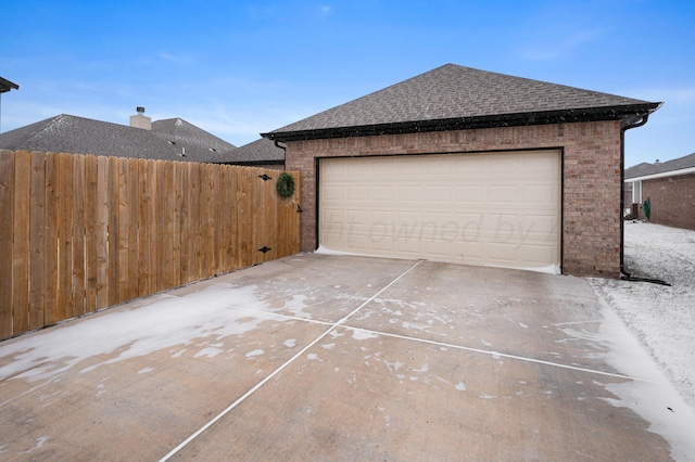 garage featuring fence