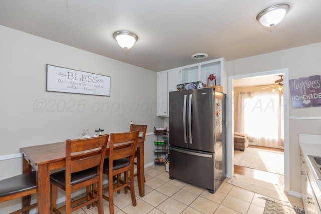 1910 S Seminole St, Amarillo, TX 79103 - dining room featuring light tile patterned floors and ceiling fan