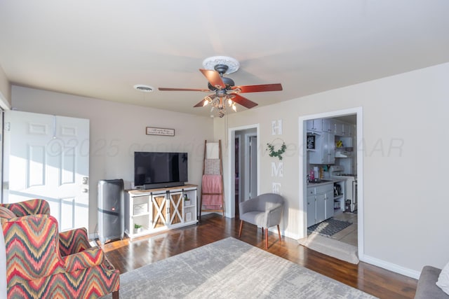 1910 S Seminole St, Amarillo, TX 79103 - living room featuring a ceiling fan and wood finished floors