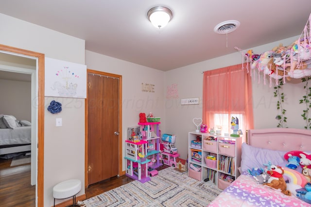 1910 S Seminole St, Amarillo, TX 79103 - bedroom with wood finished floors