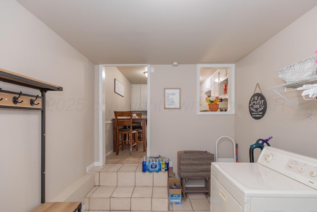 1910 S Seminole St, Amarillo, TX 79103 - laundry room with washer / dryer and light tile patterned floors