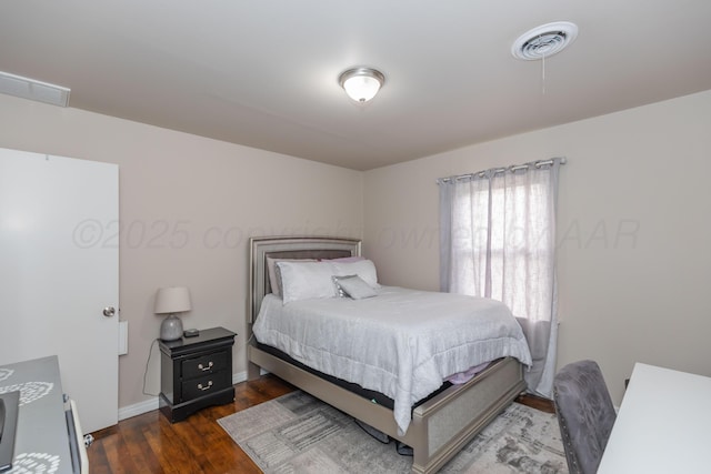 1910 S Seminole St, Amarillo, TX 79103 - bedroom featuring wood finished floors and baseboards