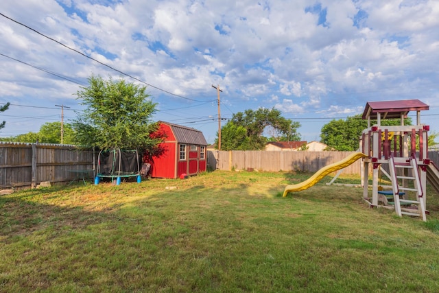 1910 S Seminole St, Amarillo, TX 79103 - fenced backyard featuring a trampoline, a storage unit, and a playground