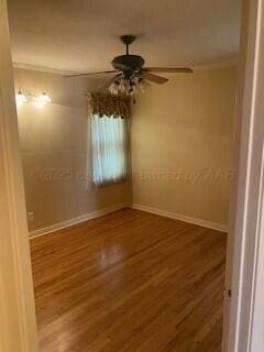 2237 Locust St, Amarillo, TX 79109 - empty room featuring baseboards, ceiling fan, wood finished floors, and ornamental molding