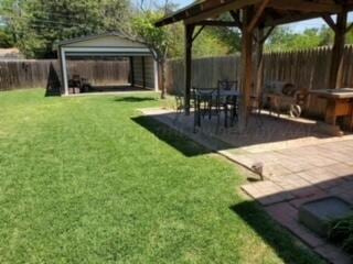 2237 Locust St, Amarillo, TX 79109 - view of yard featuring a gazebo and a patio