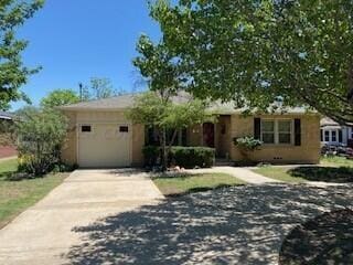 2237 Locust St, Amarillo, TX 79109 - single story home with an attached garage and concrete driveway
