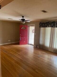 2237 Locust St, Amarillo, TX 79109 - entrance foyer with wood finished floors, a ceiling fan, and baseboards
