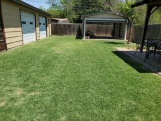 2237 Locust St, Amarillo, TX 79109 - view of yard featuring a gazebo and a garage