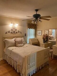 2237 Locust St, Amarillo, TX 79109 - bedroom with wood finished floors and a ceiling fan