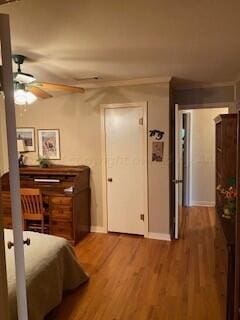 2237 Locust St, Amarillo, TX 79109 - bedroom with wood finished floors and baseboards