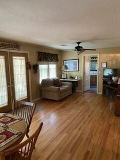 2237 Locust St, Amarillo, TX 79109 - living area with wood finished floors and a ceiling fan
