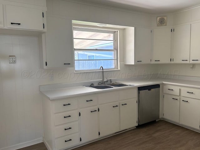 1610 Jordan St, Amarillo, TX 79106 - kitchen with stainless steel dishwasher, dark wood-style floors, white cabinets, and light countertops