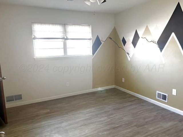 1610 Jordan St, Amarillo, TX 79106 - unfurnished room with wood finished floors and ceiling fan