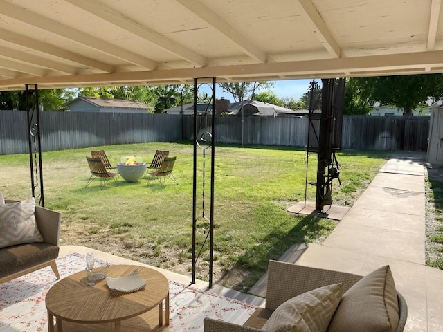 1610 Jordan St, Amarillo, TX 79106 - fenced backyard featuring a fire pit