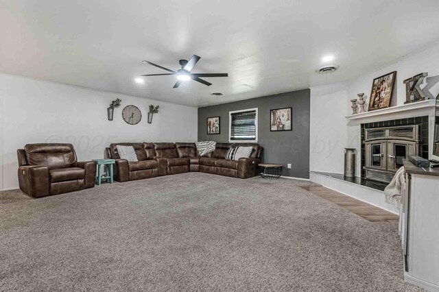 15 Fannin Dr, Tulia, TX 79088 - living area featuring carpet flooring, a ceiling fan, and baseboards