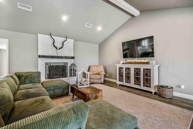 5800 Hester Rd, Amarillo, TX 79124 - living room featuring baseboards, wood finished floors, and a brick fireplace