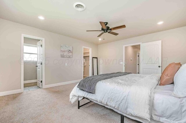 5800 Hester Rd, Amarillo, TX 79124 - bedroom featuring light colored carpet, a walk in closet, baseboards, recessed lighting, and a closet