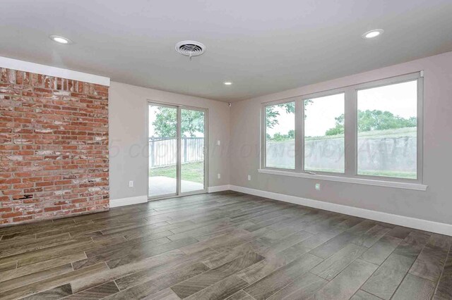 5800 Hester Rd, Amarillo, TX 79124 - spare room featuring dark wood-type flooring, baseboards, and recessed lighting