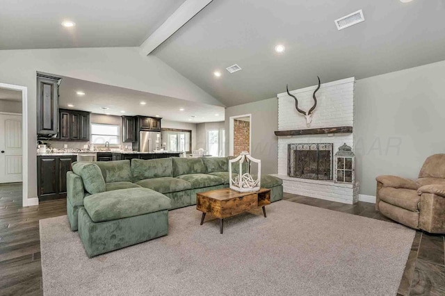 5800 Hester Rd, Amarillo, TX 79124 - living area featuring a fireplace, recessed lighting, dark wood-style flooring, and baseboards
