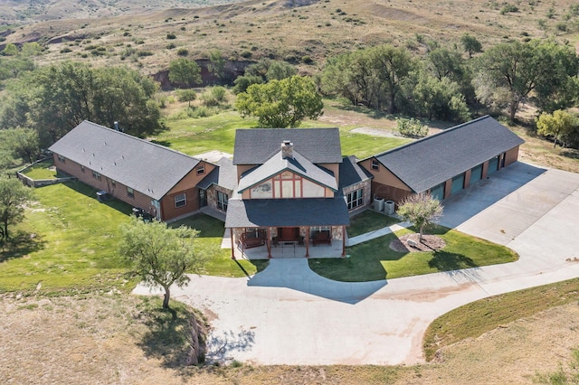 birds eye view of property with a mountain view