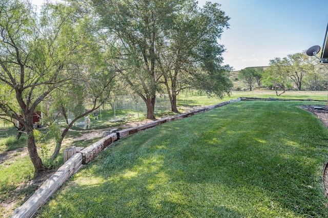 view of yard featuring fence