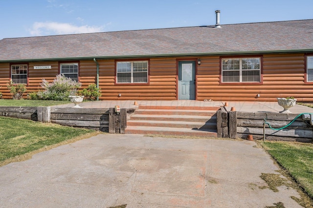view of front of home with roof with shingles