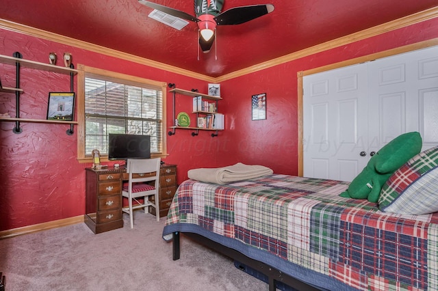 bedroom with visible vents, carpet flooring, a textured wall, and ornamental molding