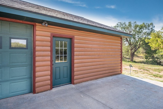 view of outdoor structure with a garage