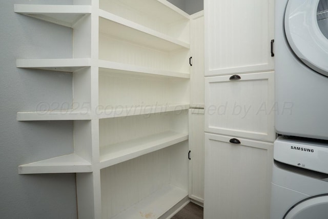 9909 Asher Ave, Amarillo, TX 79119 - storage area with stacked washer and clothes dryer