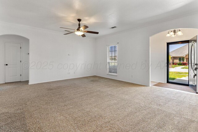 9909 Asher Ave, Amarillo, TX 79119 - empty room with arched walkways, ornamental molding, carpet floors, and ceiling fan