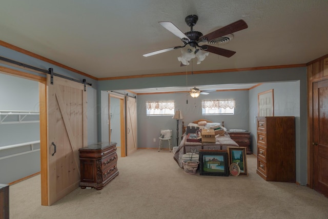 interior space with crown molding, a barn door, and light colored carpet