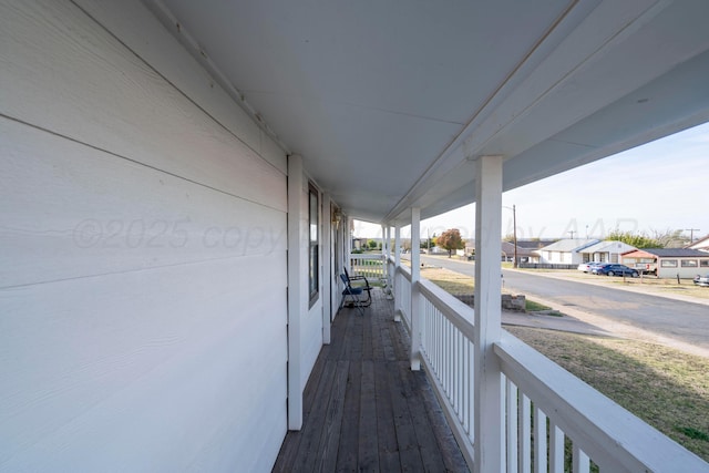 wooden terrace with covered porch