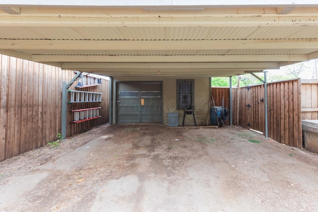 garage with a carport