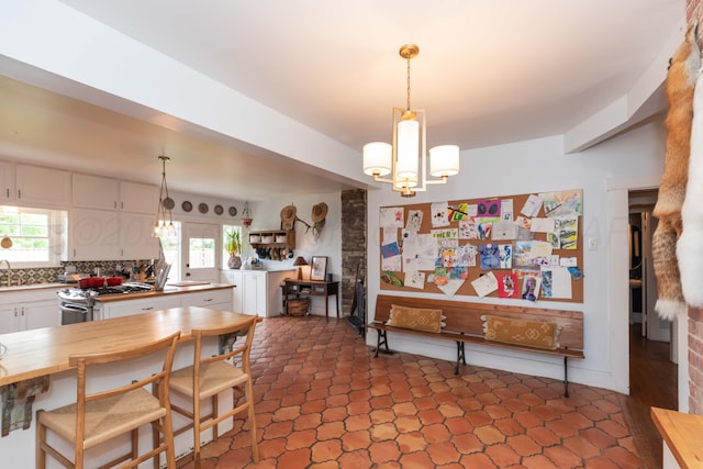 dining room featuring a chandelier