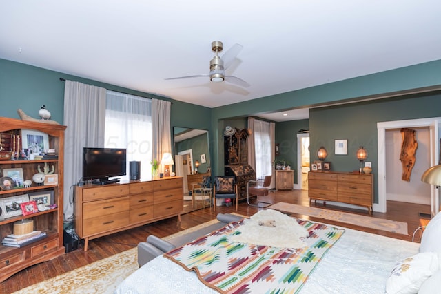 bedroom with wood finished floors and ceiling fan