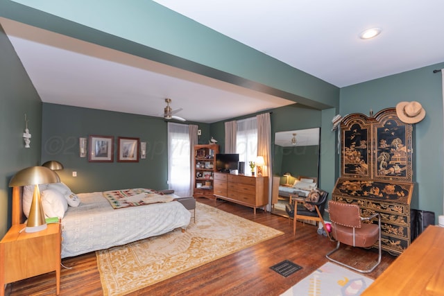 bedroom with wood finished floors and ceiling fan