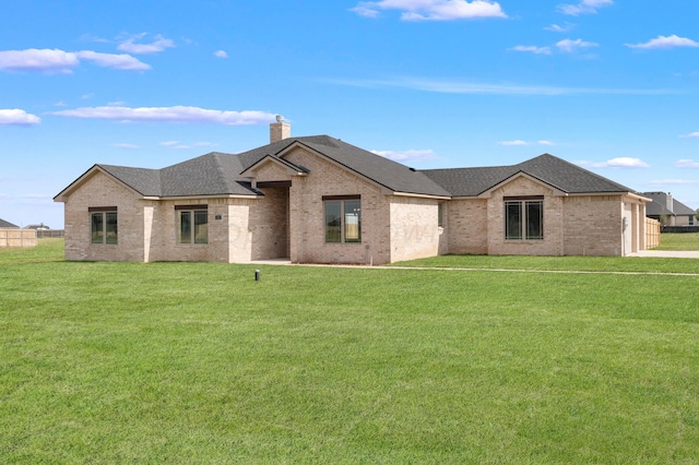 view of front of home with a front lawn