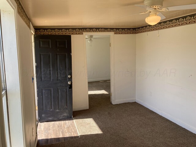 409 N Alabama St, Amarillo, TX 79106 - carpeted foyer featuring a ceiling fan and baseboards