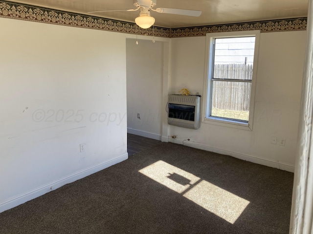 409 N Alabama St, Amarillo, TX 79106 - unfurnished living room with heating unit, carpet flooring, a ceiling fan, and baseboards