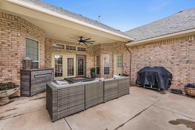 view of patio with outdoor lounge area, a ceiling fan, area for grilling, and french doors